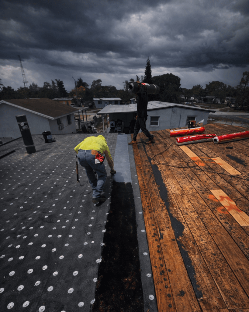 roofing team preparing roof before storm season Florida