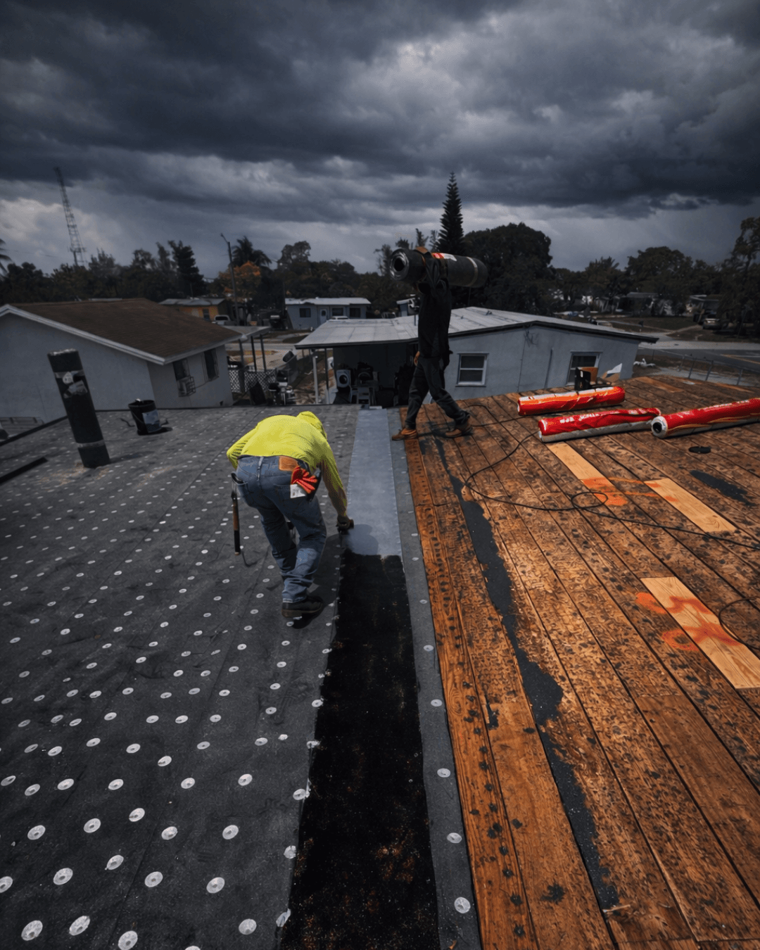 roofing team preparing roof before storm season Florida